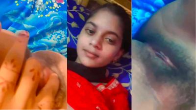 Lonely nude girl fingers her hairy pussy in bed