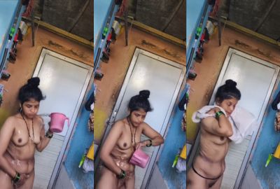 Perverted neighbor records a desi milf bathing in her bathroom